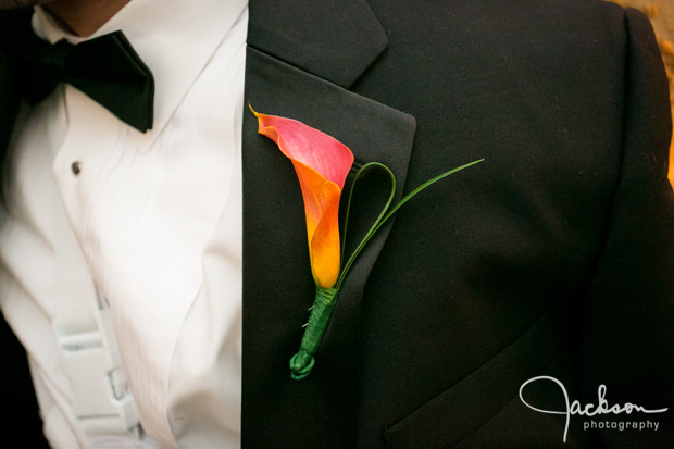 groomsmen boutonniere orange calla lily