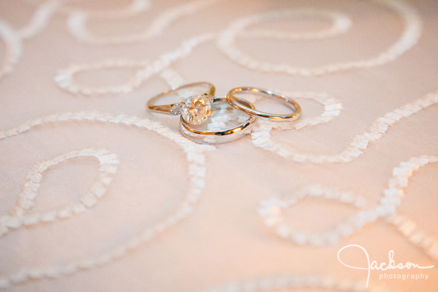 three rings on white swirled table linen