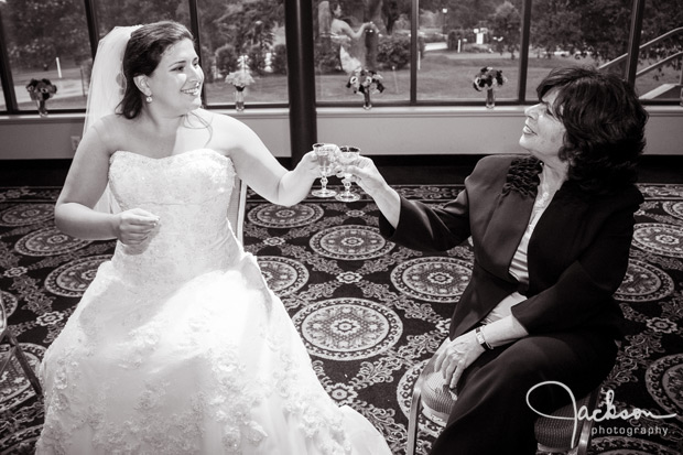 bride and mother toasting scotch