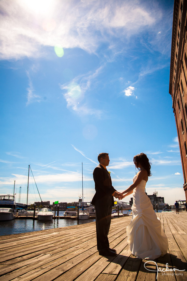 bride and groom at fells point pier