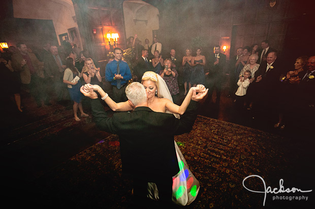 bride and groom dancing in smoke