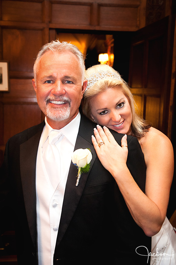 bride over grooms shoulder