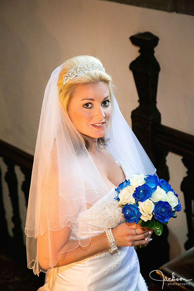 bride on staircase by window