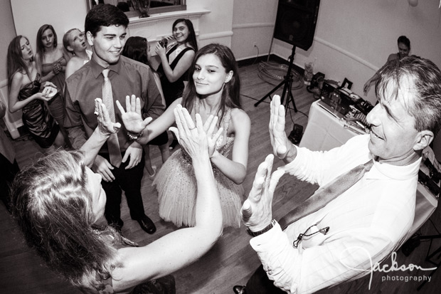 whole family dancing at mitzvah party