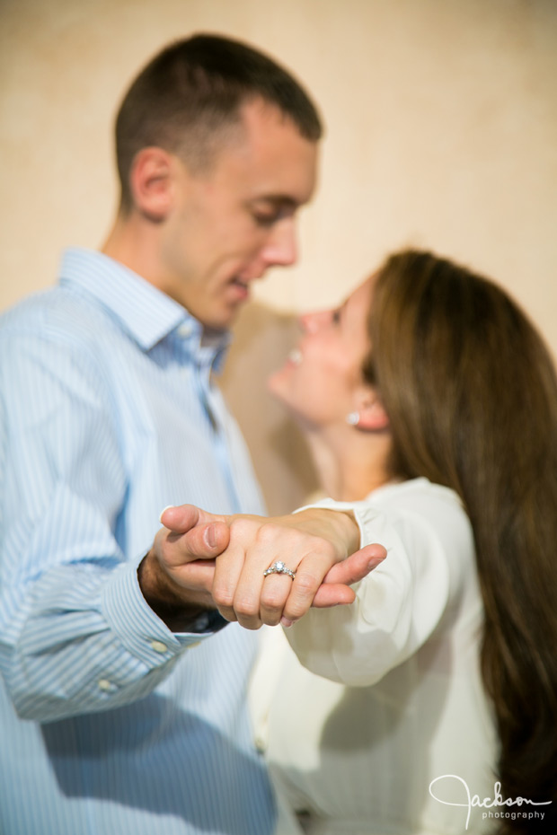 couple showing engagement rings