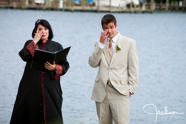 groom tearing up at ceremony