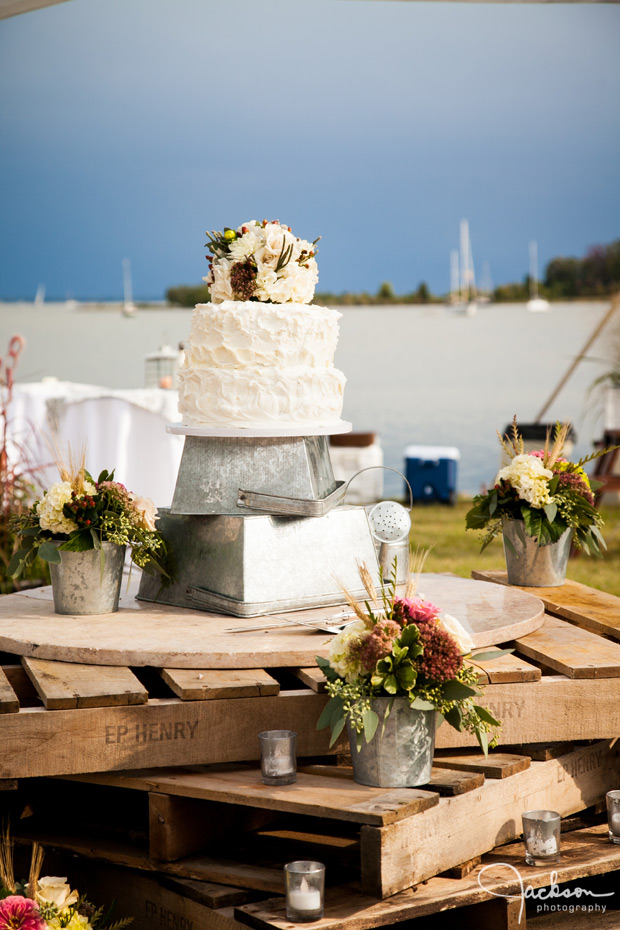 cake with watering cans and wood