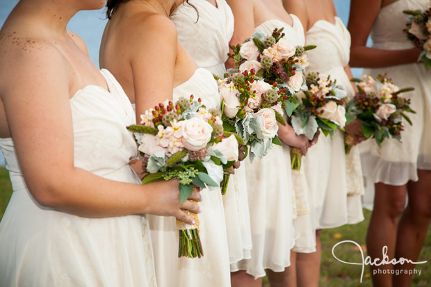 bridesmaids with brown dresses and green bouquets