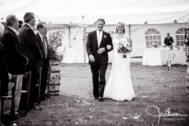 father and daughter walking down the aisle