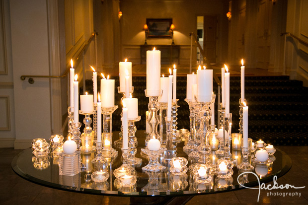 table filled with crystal and candles