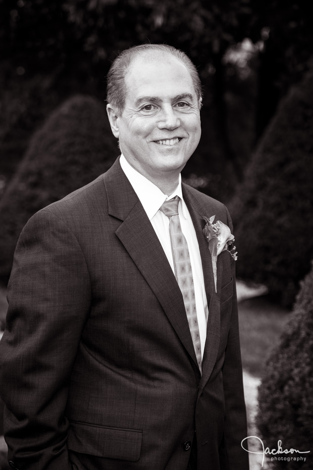 portrait of groom in black and white
