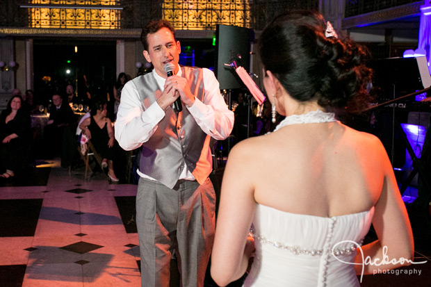 groom singing song to bride