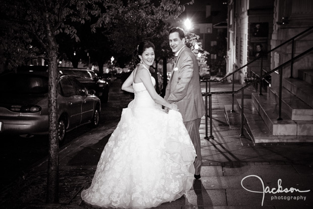 bride and groom walking at night