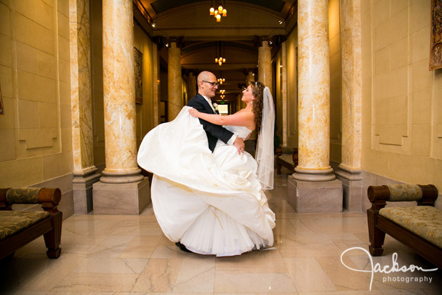 bride throwing her dress