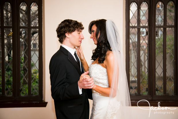 bride and groom holding each other close