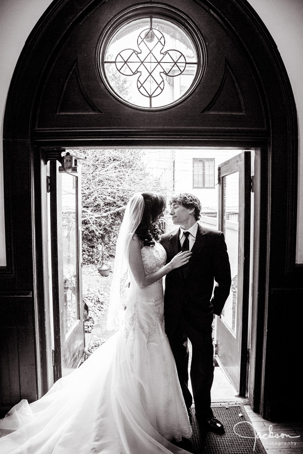 bride and groom in gothic doorway