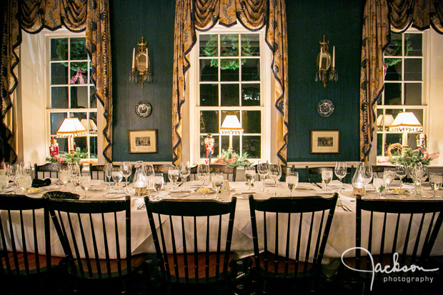 long reception table in small antique blue room