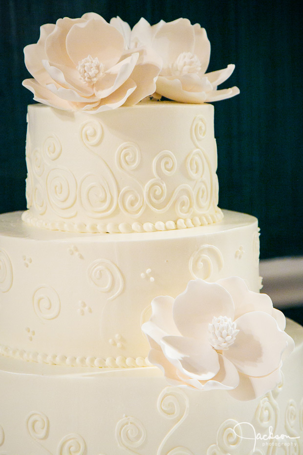 detail of ornate iced flowers on cake