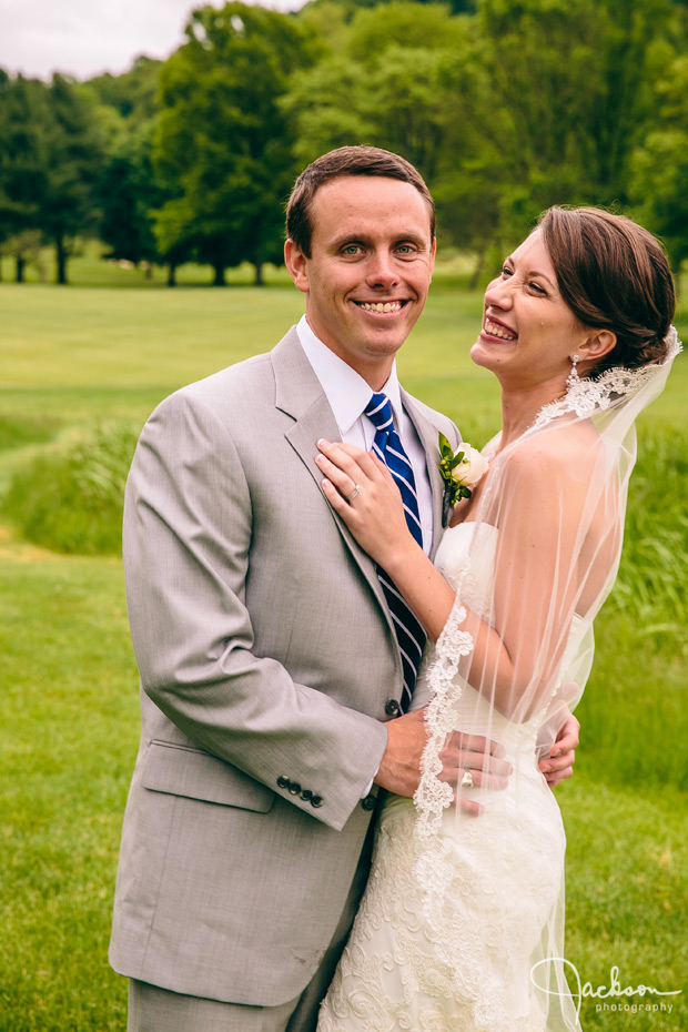 bride and groom embracing