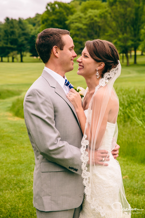 bride and groom embracing