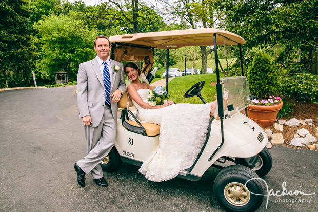 bride and groom on golf cart